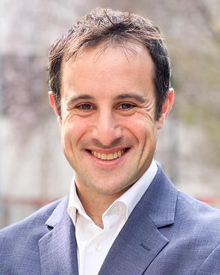 Headshot of Matthew Simonson.
